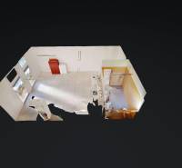 3D view of commercial spaces with tiles and walls in Holíč on Školská Street.