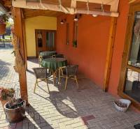 Terrace of commercial premises on Park and Main Street in Veľké Ludince.