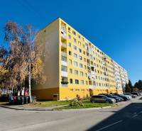 The yellow apartment building on I. Krasko Street in Prievidza, designated for 4-room apartments.