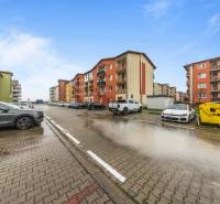 Pezinok, Veltlínska: Apartment buildings with parking on the street in front of a 2-room apartment.