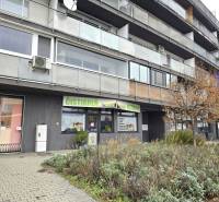 Commercial premises on Vrakunska Street in Bratislava - Podunajske Biskupice, with greenery in front of the building.