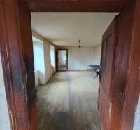 Interior of a room with a wooden decor floor. Plots - housing.