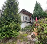 A cottage on Pod Srdcom Street in Bratislava - Devínska Nová Ves, surrounded by greenery.