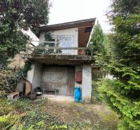 A cottage on Pod Srdcom Street in Bratislava - Devínska Nová Ves surrounded by greenery.