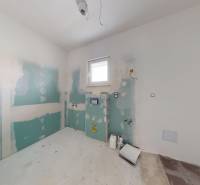 Unfinished bathroom in a family house with an unfinished sanitary installation.