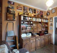 Living room with antique furniture in a 4-room apartment, floor with wooden decor.