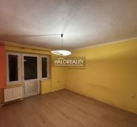 A colorful room with a wooden decor floor in a 2-room apartment.
