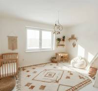 Children's room in a family house with wooden elements and natural decorations.