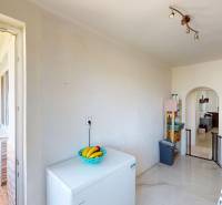 A kitchen in a 3-room apartment with a marble floor and a balcony.