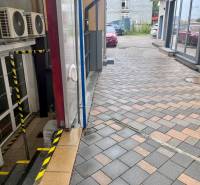 Paved sidewalk in front of commercial premises on Račianska Street in Bratislava - Nové Mesto.