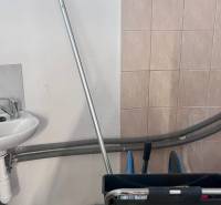 Sink and cleaning equipment in commercial premises.