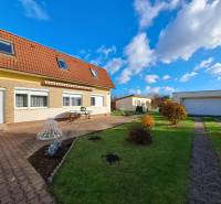 Family house on Bernolákova Street in Vráble, with a courtyard, garage, and garden.