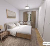 Bedroom in a family house with a bed, nightstand, and wooden decor flooring.