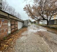 Garages on Priekopy Street in Bratislava-Ružinov with graffiti and an autumn atmosphere.