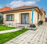 A family house in Senec on Školská Street with a terrace and garden.