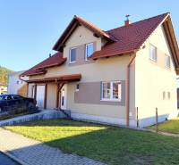 A family house on Rovinky Street in Lipany with a pitched roof and a garage.