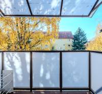 A balcony with a view of colorful trees and an apartment building, Prešov, Tarasa Shevchenka, 2-room apartment.