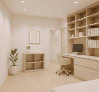 A workspace with a built-in library in a 4-room apartment with a wood-patterned floor.