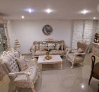 Luxurious living room of a family house with rich decor and elegant furniture.