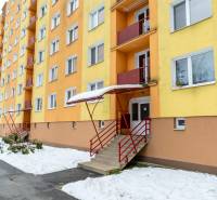 Apartment building on Štúrovo Embankment in Spišská Nová Ves during winter.