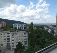 View from a 3-room apartment in Bratislava - Dúbravka, Homolova, with a panorama of the city and hills.