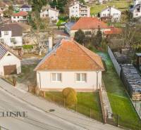 A family house on Nemečkovská Street in Prašice with two windows and a sloped roof.