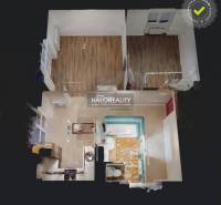 Floor plan of a 2-room apartment with wood-patterned flooring and an equipped bathroom.