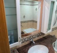 Bathroom with built-in wardrobe and mirror in a 3-room apartment.