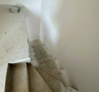 Interior staircase in a family house awaiting completion.