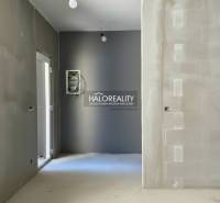 Interior of a family house with plastered walls and electrical wiring.