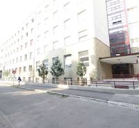 The building on Bezručova Street in Bratislava - Old Town with a ramp and trees.