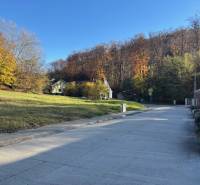 A peaceful street on Karpatská in Marianka, surrounded by greenery, ideal for plots - housing.