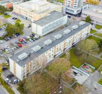 Aerial view of residential buildings and a parking lot on Zornička Street in Galanta.