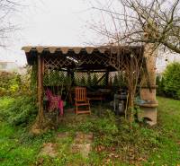 The garden of a family house on Partizánska Street in Bánovce nad Bebravou, a gazebo with furniture.