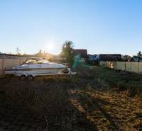 Land on Borovicova Street in Lozorno with a boat and a paved surface.