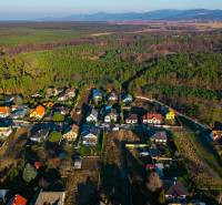 Aerial view of houses and forests on Pine Street in Lozorno, Land - housing.