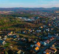 Aerial view of houses and greenery in Lozorno on Borovicova; ideal for residential plots.