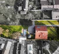 Aerial view of a villa on Andrej Sládkovič Street in Žarnovica with a pool and garden.