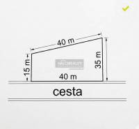 Plot of land for residential use in Rudník with dimensions 40x15x35 meters near the road.
