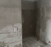 Renovations in the bathroom of a family house, water piping, and electrical outlets.