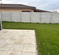 A family house in Tomášov on Fialková Street with a garden, terrace, and fence.