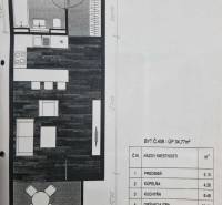 Floor plan of a one-bedroom apartment with a kitchen, bathroom, and living room.