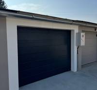 The gate of a modern garage on Slnečná Street in Komárno, equipped with electric control.