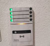 Card reader in offices, with colored LED indicators, mounted on the wall.