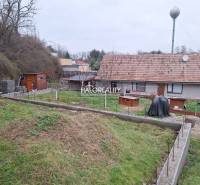 Family house in Brestovany with extensive garden land and a shelter for garden tools.