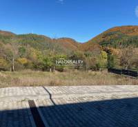 Autumn landscape in Kľačno with a hilly background. Land - residential for sale.