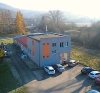 Production premises on Továrenská Street in Dubnica nad Váhom with parking spaces.