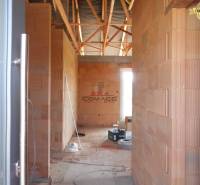 In the unfinished family house on Nové Mesto nad Váhom street, there are brick walls.