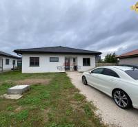 A family house in Nové Mesto nad Váhom, with a car parked in the driveway.