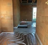 Installation of underfloor heating in a family house on Nové Mesto nad Váhom street.